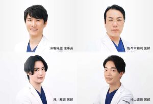 白衣を着た男性医師4人